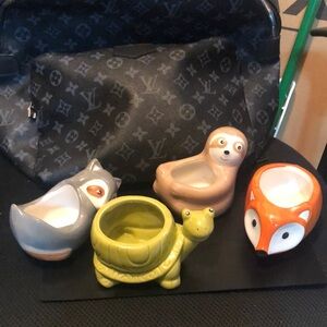 Four animal planters